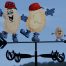 Custom made business weathervane featuring potato cartoon characters hand painted.